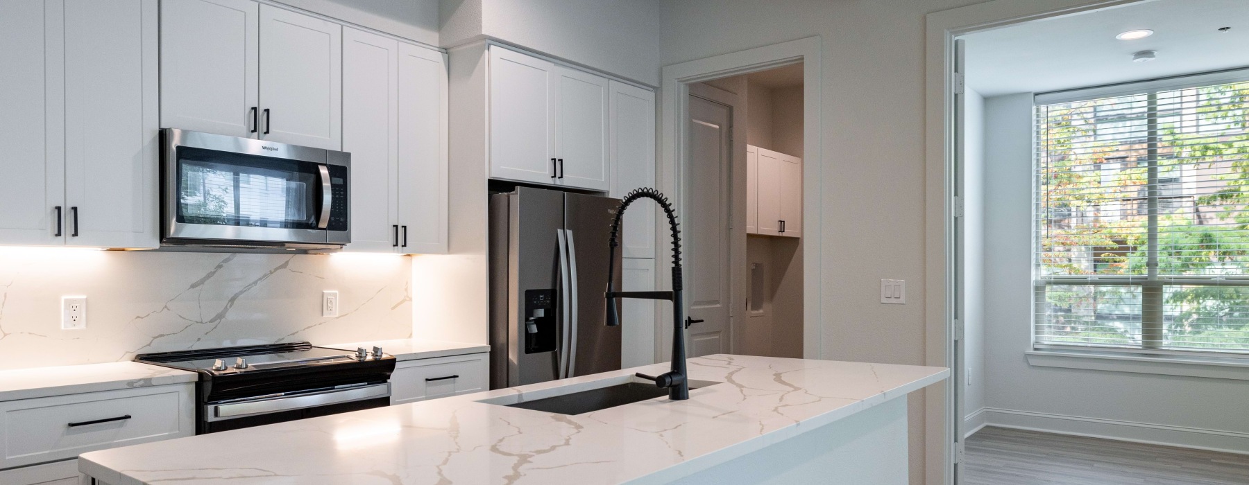 Well-lit kitchen with ample counter space