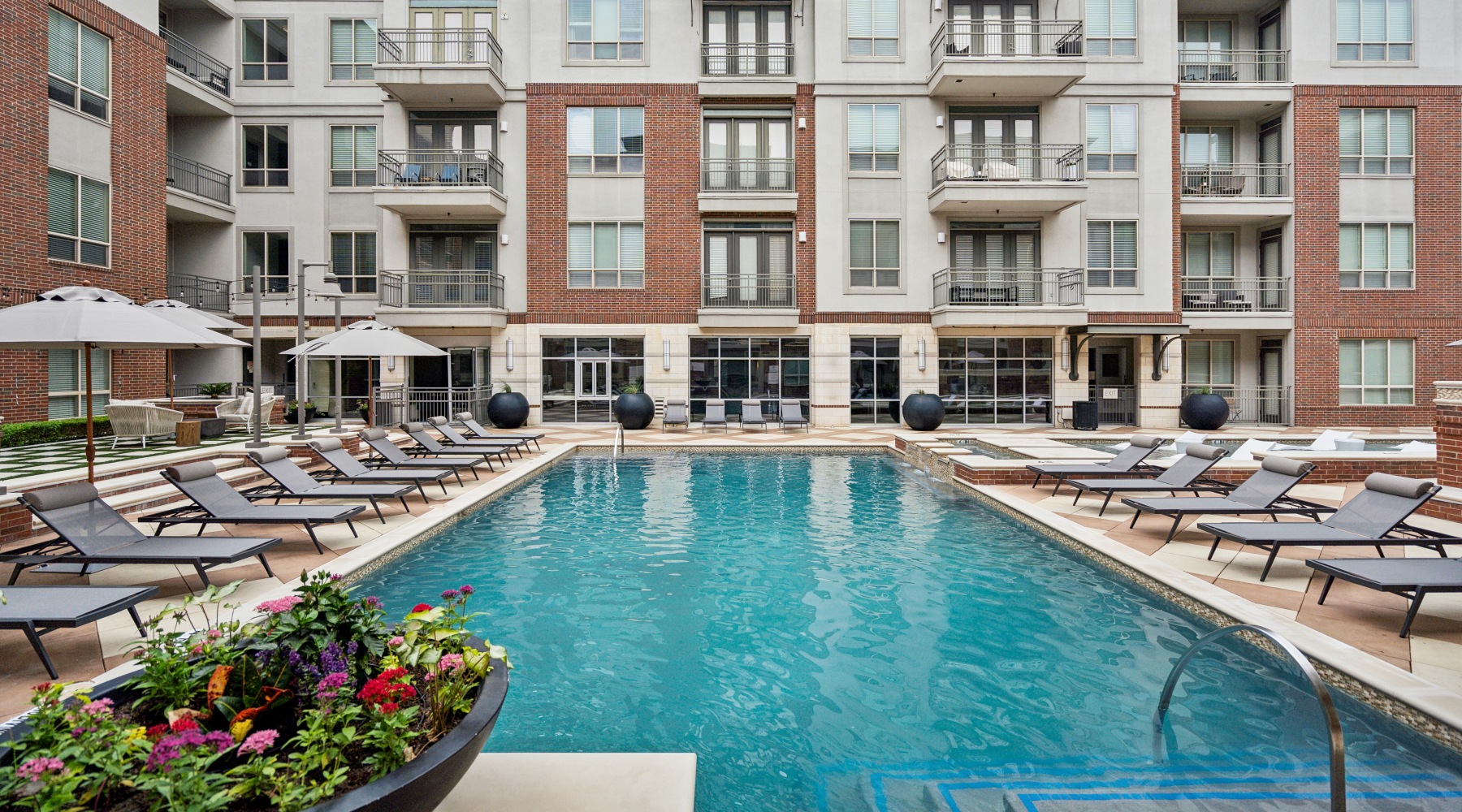 Swimming Pool Large sparkling pool with a large pool deck
