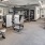 Large fitness center with cardio and weight lifting equipment.