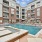 wading pool waterfalls into larger swimming pool